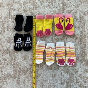 Pet socks all 3 pairs:  pink flamingo, striped, & black skeleton never used